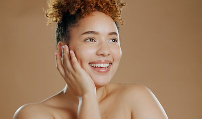 Image showing Woman, hand on face with natural beauty and happy with cosmetics and skin glow isolated on brown background. Dermatology, wellness and skincare, model smile for self care and anti aging in studio