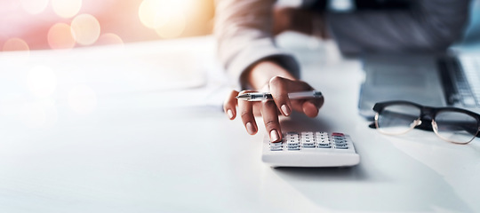 Image showing Person, hand and calculator for finance, budget planning or accounting audit on mockup at office. Closeup of accountant or employee in financial management, profit or expenses on bokeh background