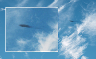 Image showing Spacecraft, ufo in sky and alien on camera screen outdoor, science fiction fantasy or conspiracy theory. Evidence of extraterrestrial spaceship blur, surreal saucer fly in clouds and camcorder record