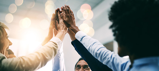 Image showing Closeup, high five and business people with support, hands and collaboration with mission, achievement or cooperation. Staff, group or corporate professionals with teamwork, bokeh or celebration