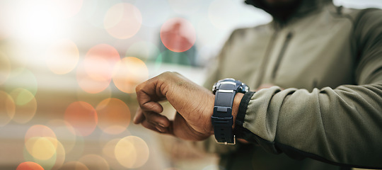 Image showing Hand, smart watch and monitor for fitness, training or exercise schedule with bokeh for personal trainer. Athlete, person and stopwatch or timer for performance update, steps or results for wellness