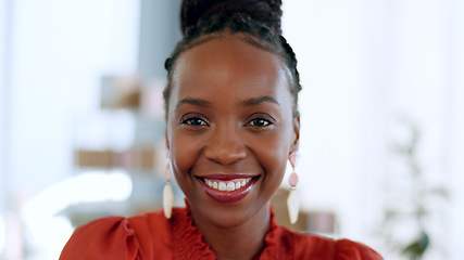 Image showing Portrait, happy and a black woman employee closeup in the office of her small business boutique. Face, fashion and smile with a young creative entrepreneur in her professional workplace for design
