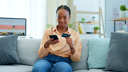 Image showing Black woman, phone and credit card on sofa for payment, online shopping or fintech at home. Happy African female person in relax with debit or mobile smartphone for transaction, bank app or ecommerce