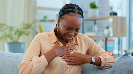 Image showing Black woman, chest pain and heart attack with health at home, emergency and breathing issue with indigestion. Respiratory, pneumonia or tuberculosis, lungs or cardiovascular healthcare or anxiety