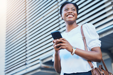 Image showing Phone, smile and young woman in the city networking on social media, mobile app or the internet. Happy, technology and African female person scroll on cellphone and walking in urban town street.