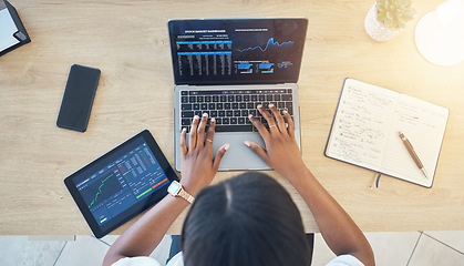 Image showing Person, hands and laptop, stock market and trading with tablet, notebook and typing top view of workspace. Cryptocurrency, research and investment with dashboard, stats and graph on screen for trader