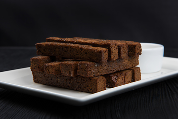 Image showing Crackers with garlic from black bread