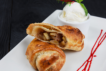 Image showing Apple strudel with vanilla ice cream