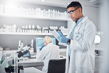 Image showing Scientist, tablet and research innovation in laboratory for medical analytics, science development or biotech neuroscience. Pharmaceutical data, doctor and pharmacy engineer working in clinic lab