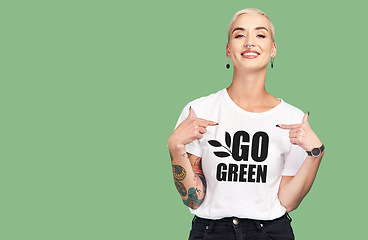 Image showing Mockup, sustainable fashion and green background, woman with tshirt and space for eco friendly product placement. Sustainability, fashion and climate change influencer with smile and cotton clothes.
