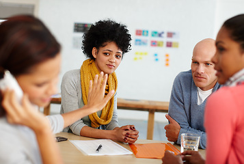 Image showing Office, communication and phone call with stop hand for distraction, silence and focus. Shut up, quiet and rude girl employee on smartphone talking at desk with unhappy coworkers together.