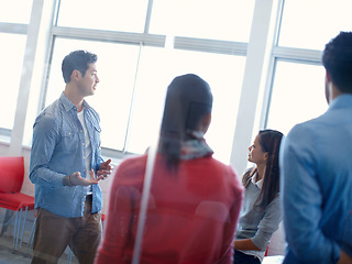 Image showing Communication, training or strategy team in meeting at startup office with focused employees. Planning, management or collaboration of marketing workers for professional company development.