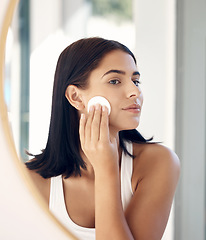 Image showing Beauty, mirror reflection and woman with cotton pad for facial cleaning, makeup removal or home skincare routine. Health, wellness or face of model girl with cosmetics product for self care treatment