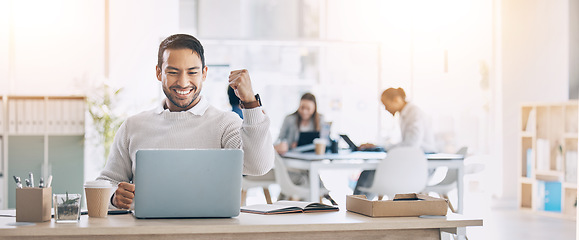 Image showing Man, laptop and celebrate at office desk for success, deal or crypto on internet at startup. Winner businessman, computer or smile for winning celebration, bitcoin goal and stock market achievement