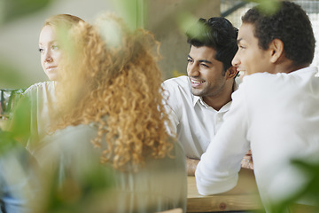 Image showing Business team, meeting and planning in a restaurant with a man and woman employee group working in collaboration. Teamwork, strategy and training with male and female colleagues at work in a cafe