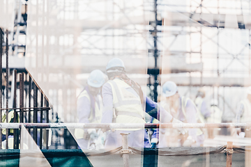 Image showing Team of construction worker on construction site.