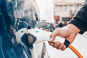 Image showing Electric Car in Charging Station.