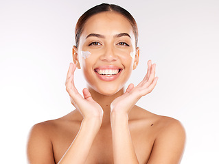 Image showing Skincare, beauty cream and face of woman with lotion for hydration, glow and healthy skin on studio background with a smile. Portrait of aesthetic model happy about cosmetics, makeup and dermatology