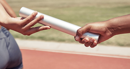 Image showing Hands, team and sports relay baton for running, sprint or fitness marathon for olympic athletics on stadium track. Hand of runner holding bar in teamwork sport for run, race or competition of speed