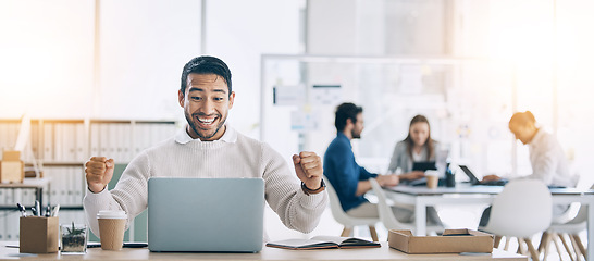 Image showing Winning, achievement and businessman with trading success, stock market motivation and online deal with a laptop. Winner, wow and marketing employee happy to celebrate while reading email in office