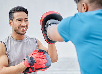 Image showing Personal trainer, man boxer and training for boxing match, cardio fighting workout and punching exercise. Fitness coach, sport motivation and men learning to fight for competition tournament outdoors