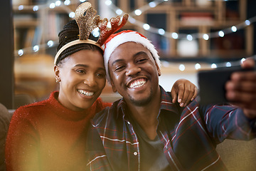 Image showing Phone, selfie and couple relax in a city for christmas celebration, bonding and happy together outdoors. Black couple, photo and man with woman downtown for festive, fun and season cheer with mockup