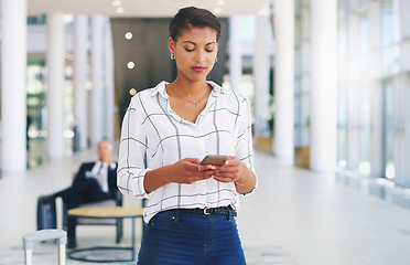 Image showing Business woman, phone or reading email communication on web app while sitting at office. Black woman smartphone typing, message app or social media on mobile smartphone or internet technology at work