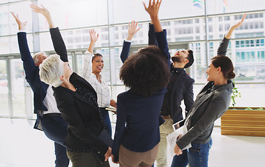 Image showing Success, celebration and excited business people in the office after project, deal or partnership. Collaboration, team building and corporate team with motivation, happiness and teamwork in workplace