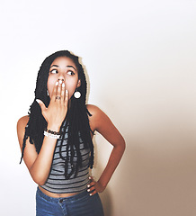 Image showing Black woman, shocked and surprised with hand over her mouth in expression against a gradient studio background. African American female model face posing in shock for sale, secret or gossip on mockup