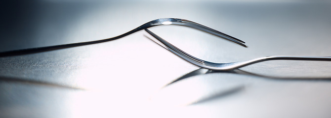 Image showing Collaboration, teamwork and balance with two fork utensils together in studio on a gray background as a symbol of unity. Partnership, relationship and together with a kitchen utensil pair on a table