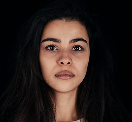 Image showing Woman, face or mental health on black background in studio or depression, anxiety or psychology bipolar disorder. Zoom, headshot or portrait of stress, burnout or sick addict in rehabilitation center