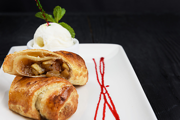 Image showing Apple strudel with vanilla ice cream