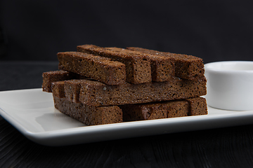 Image showing Crackers with garlic from black bread