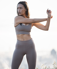 Image showing Fitness, nature and woman stretching in running training, cardio exercise or outdoor workout in peace. Focus, morning and healthy sports girl runner ready to start activity or exercising a slim body