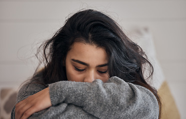 Image showing Woman, stress and depression in lonely mental health problems, issues or anxiety at home. Sad female face suffering from loneliness, withdrawal or abuse with depressed emotion alone in the bedroom