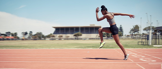 Image showing Run, black woman and running on track for marathon, fitness and workout for wellness, health and practice. Female athlete, healthy girl and runner for game, sprint or exercise for training or balance