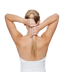 Image showing Hair, hairstyle and back of blonde woman with a ponytail on a white studio background. Hair care, hair style and blond female styling long hair with care and beauty on a studio backdrop