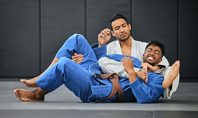 Image showing Men fighting in karate competition, coach training student at fitness class and learning martial arts at sports club together. Strong trainer doing health exercise with male and showing self defense