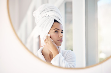 Image showing Mirror, skincare woman in bathroom for cleaning, facial and skin product or cotton in her home with mockup. Face, beauty and girl with hydration cosmetic treatment after shower, hygiene and grooming