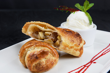 Image showing Apple strudel with vanilla ice cream