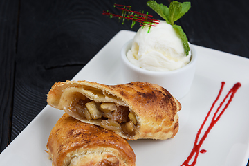 Image showing Apple strudel with vanilla ice cream