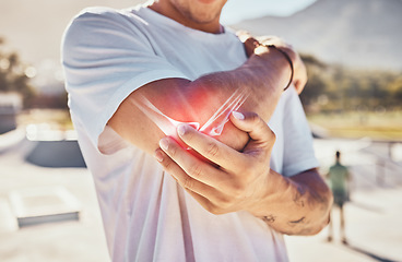 Image showing Man, joint pain and elbow arthritis in outdoor closeup in summer sunshine with massage arms. Broken arm, bone and guy at urban park in metro, city or town with physical therapy with hands in zoom