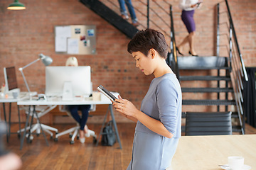 Image showing Business woman, tablet and digital marketing while online doing internet research for copywriting for target audience on social media platform. Content creator entrepreneur at a advertising agency