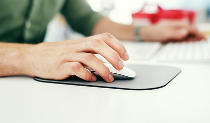 Image showing Hand, computer mouse and ecommerce with a business man working on a desktop in his company office. Marketing, software and networking with a male employee clicking a button while working alone