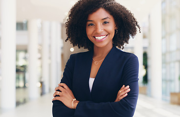 Image showing Corporate woman, portrait and leader smile in office with arms crossed. Business manager, happy ceo and startup leadership motivation in modern workplace or black woman entrepreneurship empowerment