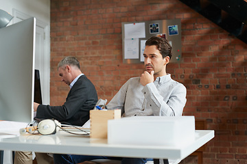 Image showing Young businessman, office employee at desk and man thinking of strategy, business solution and marketing idea in advertising agency. Corporate consulting firm, CRM consultant and company professional