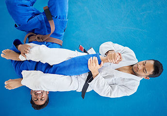 Image showing Top view, karate and men training for competition, fitness and fighting for match, wellness or health. Mma, healthy males or practice for game, martial arts and exercise for workout, power or routine