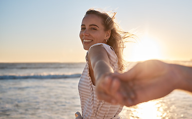 Image showing Couple at beach, holding hands and love at sunset, travel together and adventure with romantic vacation portrait. Relationship with care, ocean and peace, support or trust and bonding with mockup.