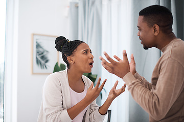 Image showing Divorce, angry or black couple fight about money loan, mortgage debt or financial problems at home in Nigeria. Anger, communication and stressed black woman shouting at a frustrated African partner