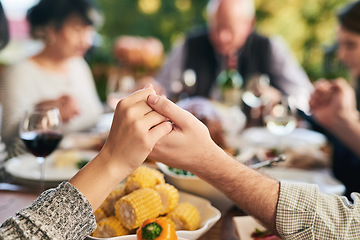 Image showing Party, food and family holding hands for prayer before eating chicken, barbecue or turkey at a social event. Corn, Christmas and Christian friends praying before enjoying meat and vegetables meal